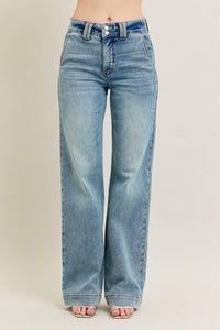 Light blue jeans on a plain background
