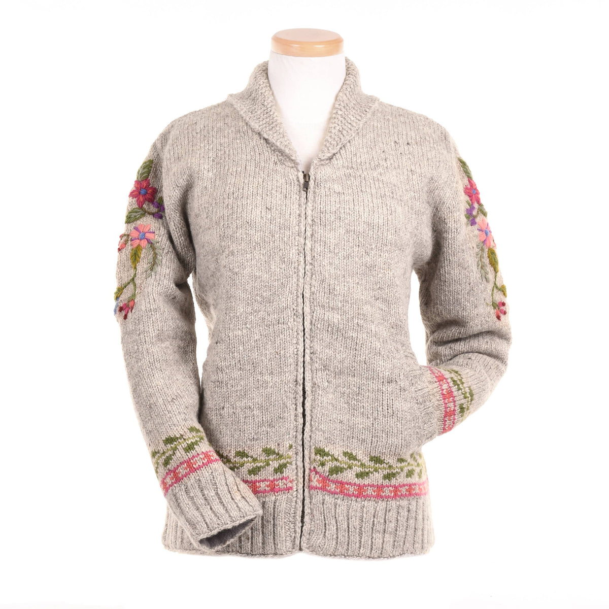 Gray zip-up sweater with floral patterns on sleeves and hem on a mannequin against a white background