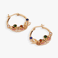 Gold hoop earrings with colorful gemstones on a white background