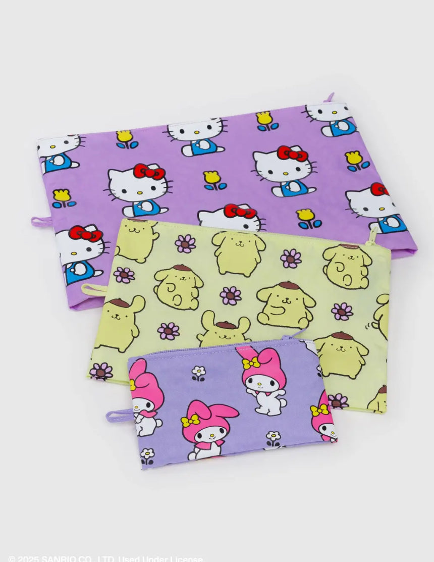 Three pouches with Hello Kitty and dog patterns on a white background