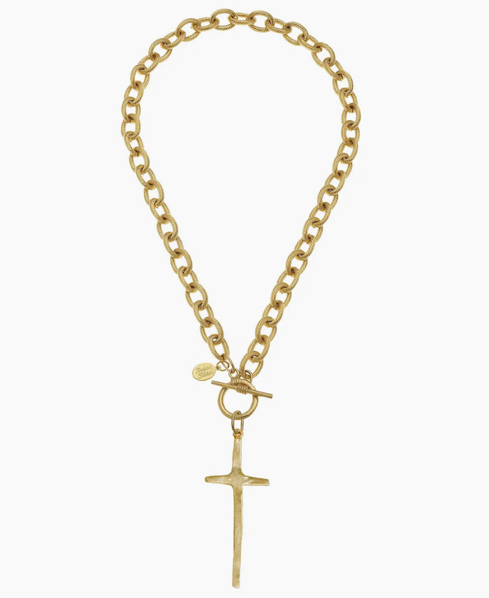 Gold chain necklace with a cross pendant on a white background