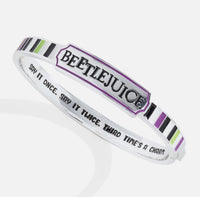 Wristband with 'Beetlejuice' text and design on a white background
