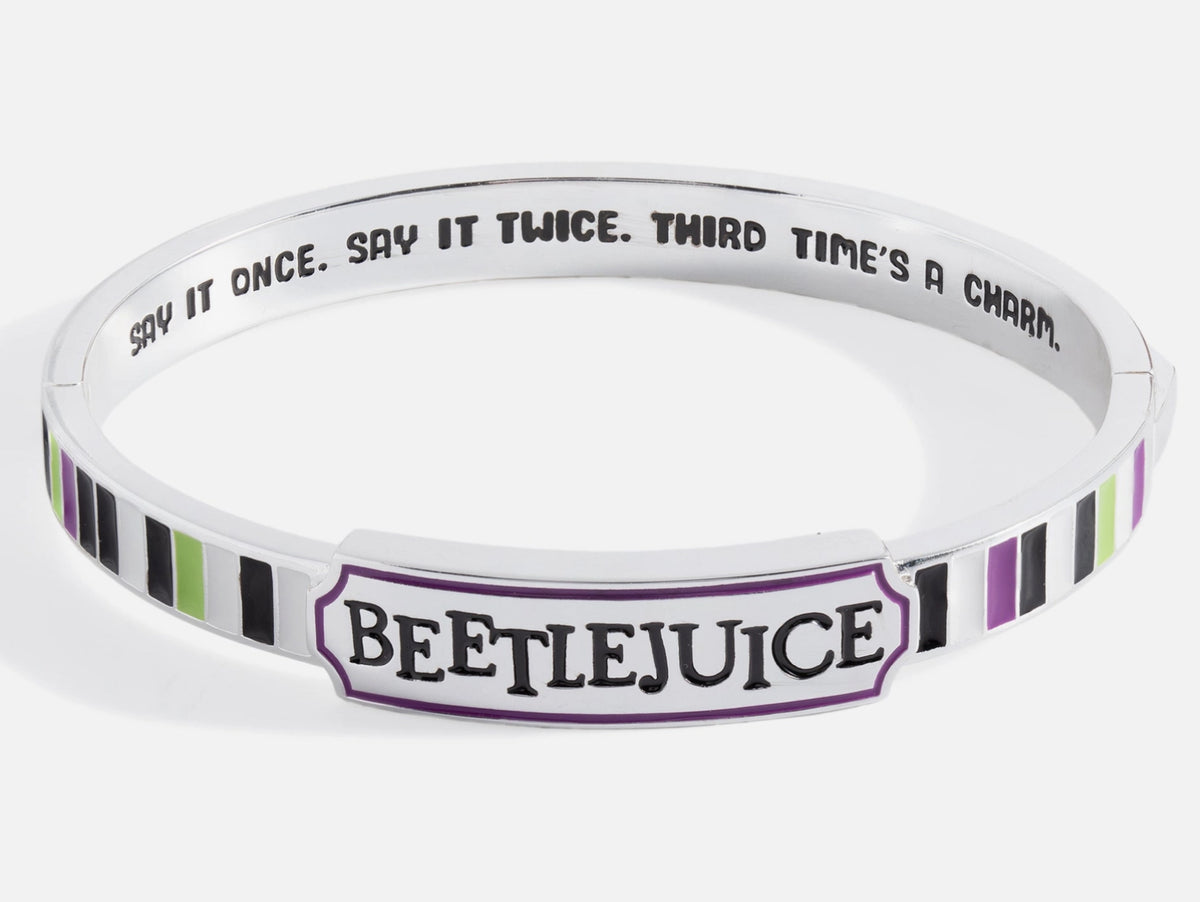 Wristband with 'Beetlejuice' text and design on a white background