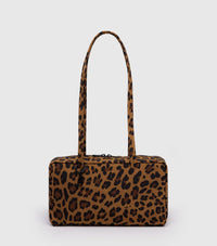 Leopard print handbag on a light gray background