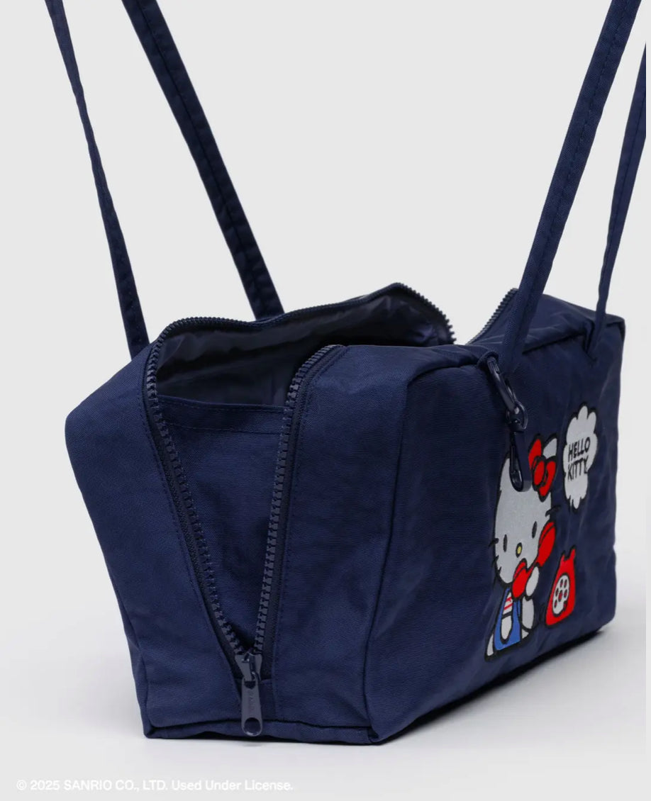 Navy blue bag with a Hello Kitty design on a white background