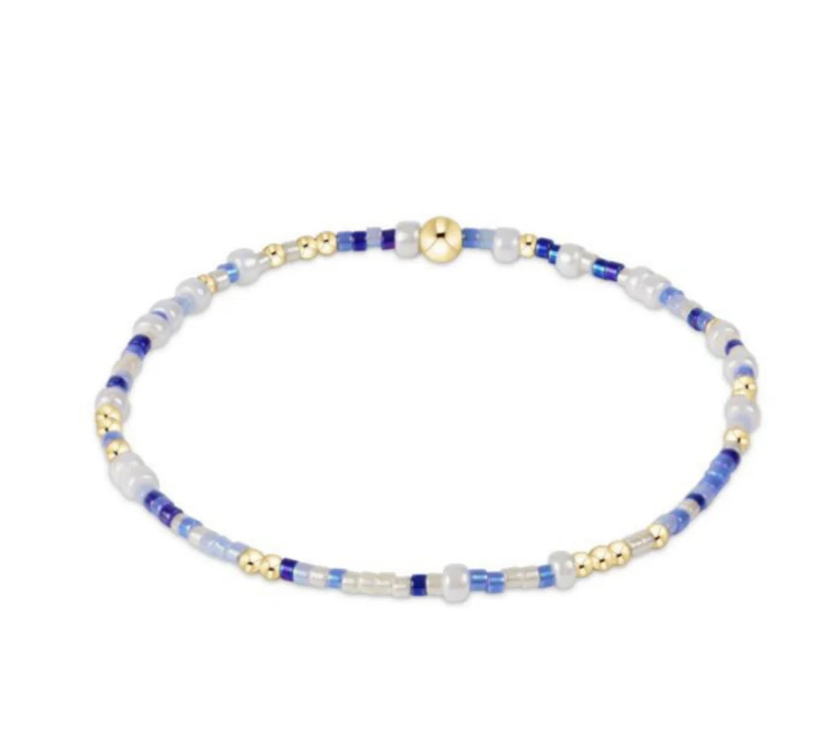 Beaded bracelet with blue, white, and gold beads on a white background