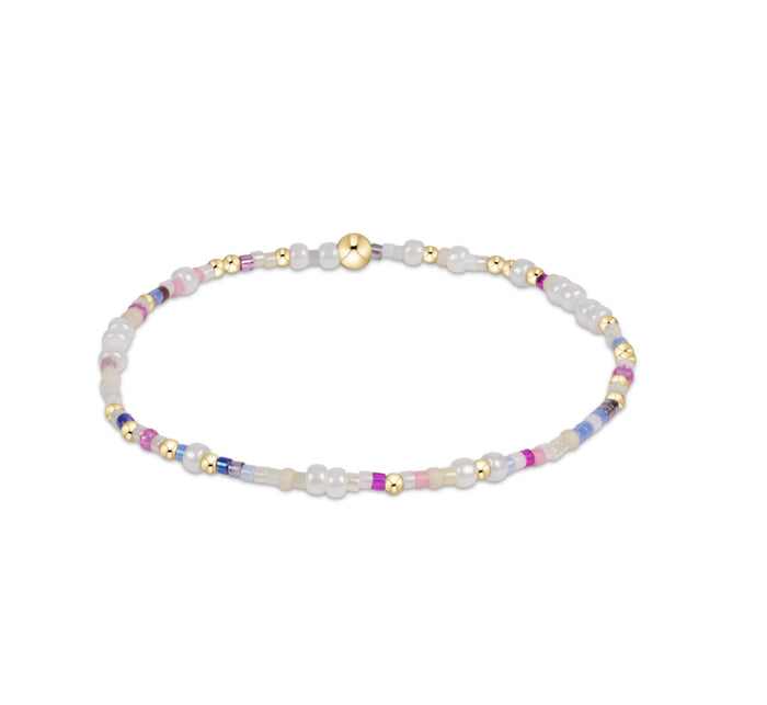 Bracelet with multicolored beads on a white background