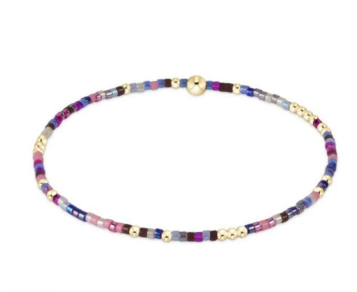 Multicolored beaded necklace on a white background