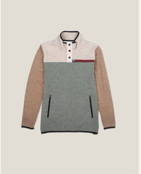 Color-blocked pullover with beige sleeves and gray torso on a light beige background