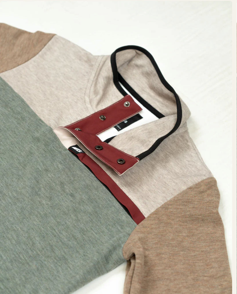 Color-blocked hoodie with a red pouch on a white background