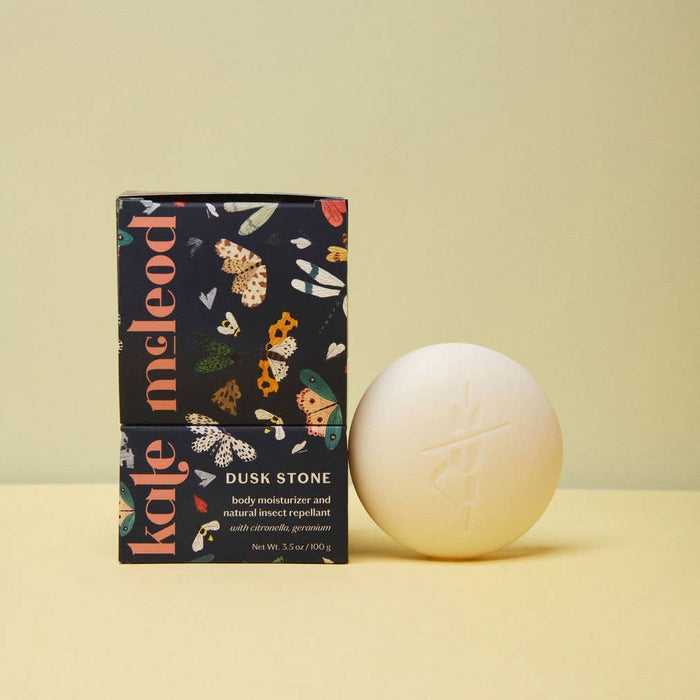 Kate McLeod Dusk Stone packaging with a white stone on a beige background