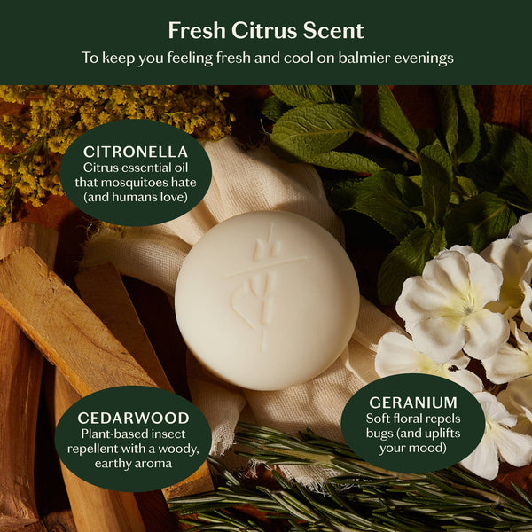 Soap bar with botanical elements and text about fresh citrus scent and essential oils.