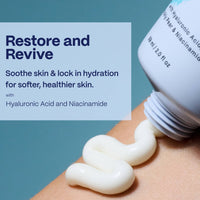 Skincare cream being applied to skin with text about restoring and reviving skin.