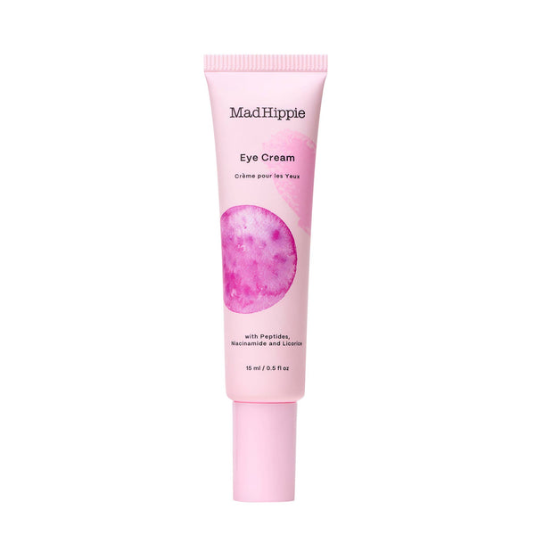 Pink tube of Mad Hippie Eye Cream on a white background