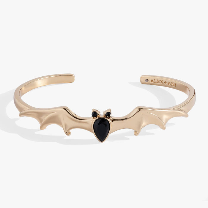 Rose gold bat-shaped bracelet with a black heart on a white background
